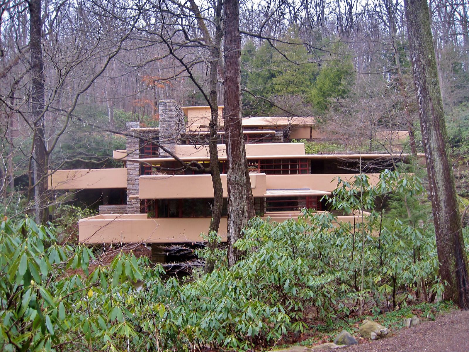 Frank Lloyd Wright's Fallingwater, its cantilevered terraces set among bare trees